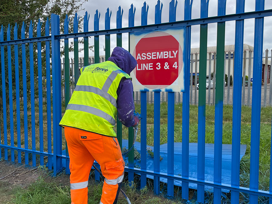 Spraying the perimeter fences